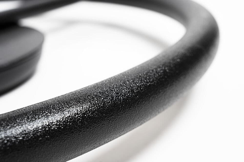 Close-up van de zwarte ringvoet met gestructureerde coating